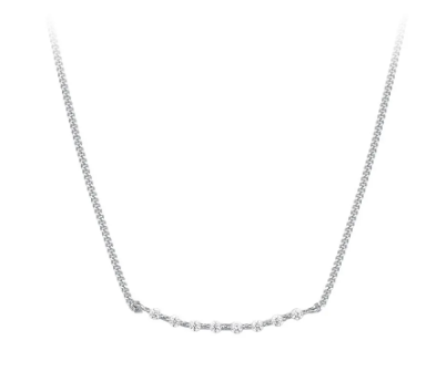 a silver necklace with five stones on it