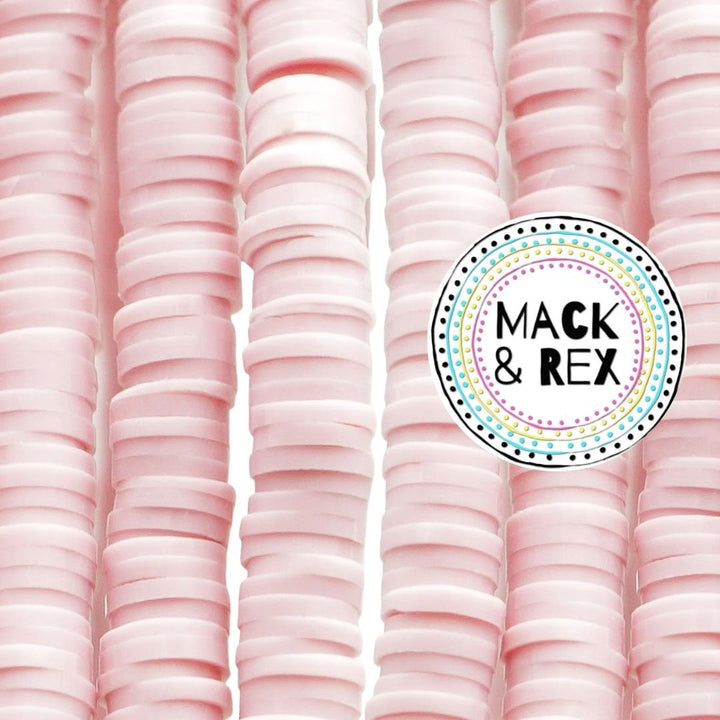 a pile of pink plastic cups sitting next to each other