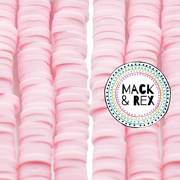 a close up of a pile of pink macaroni and cheese macaroni