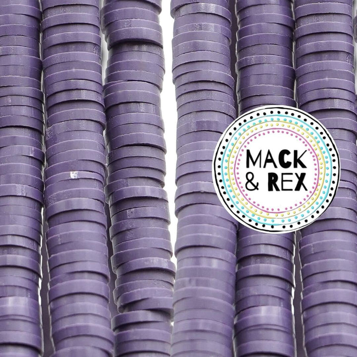 a pile of purple cups sitting next to each other