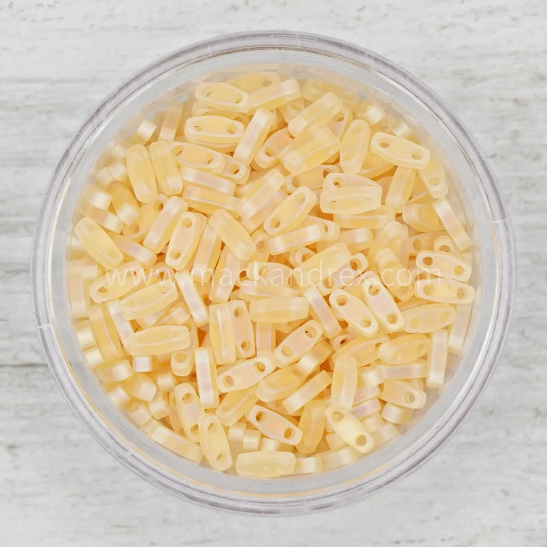 a bowl filled with lots of yellow pasta
