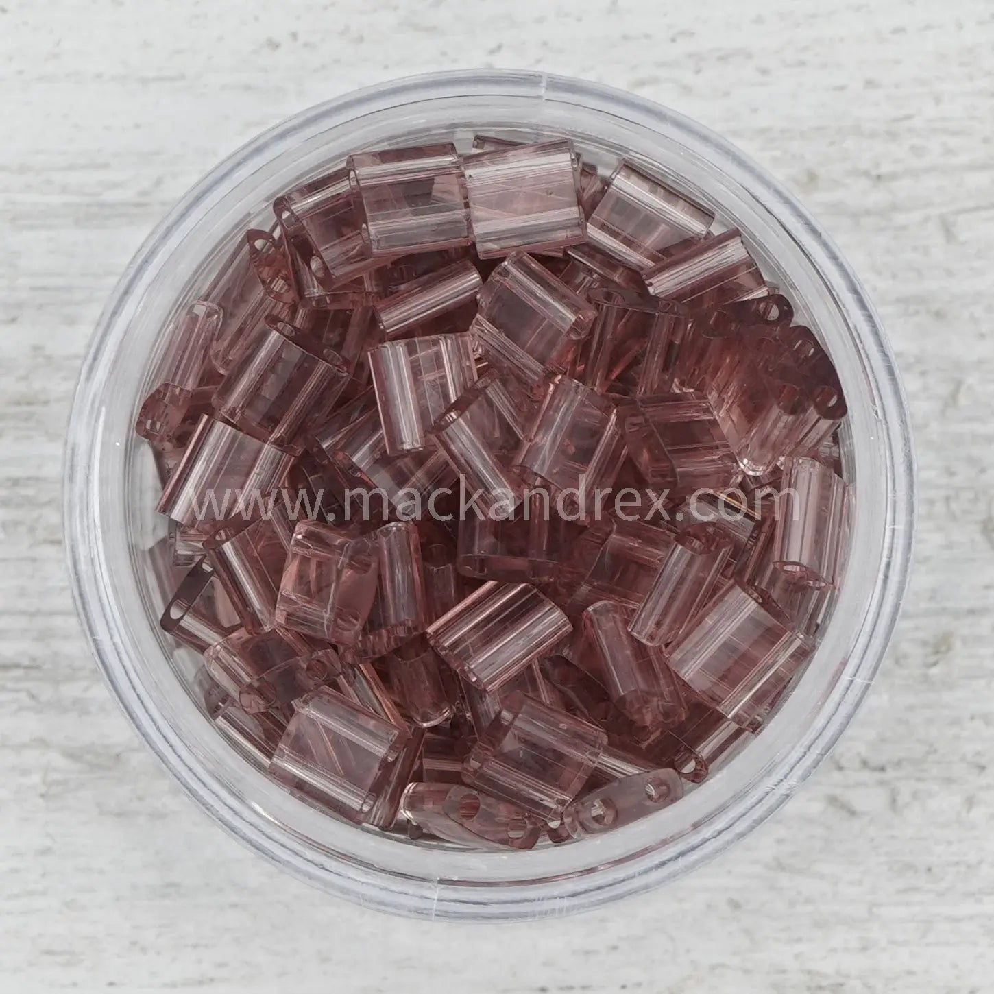 a bowl of chocolate colored glass beads