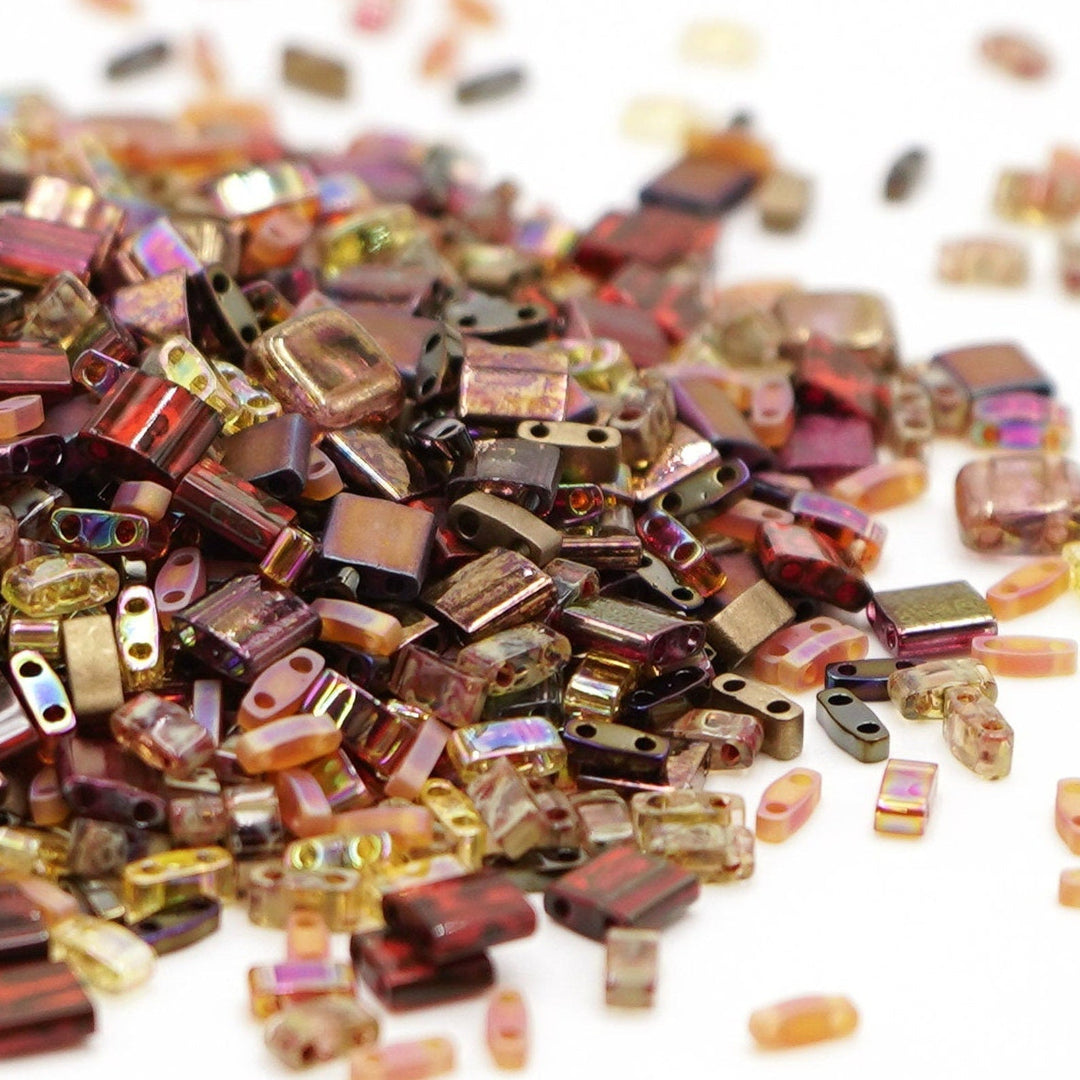 a pile of beads sitting on top of a white table