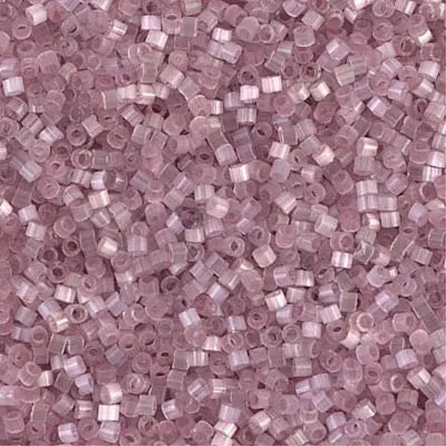 a close up of a purple glass mosaic tile