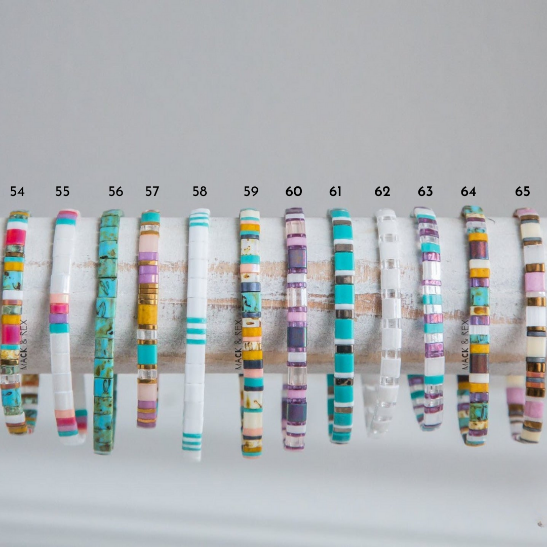 a line of bracelets with different colors and sizes