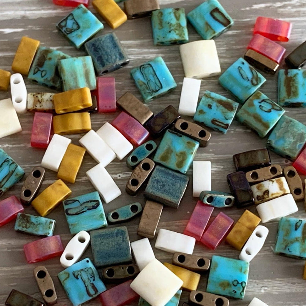 a close up of a bunch of beads on a table