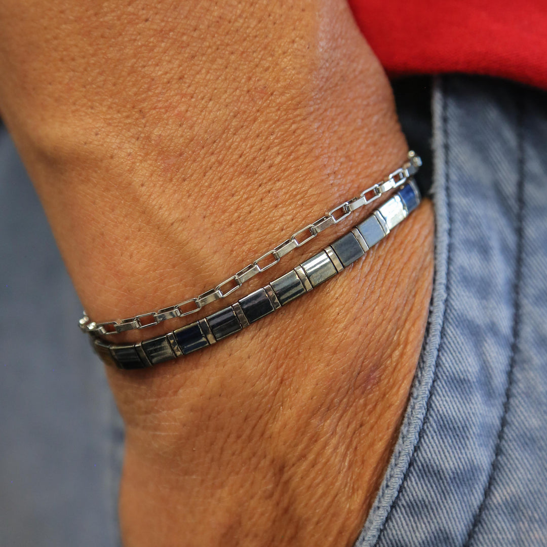 Convict set of bracelets on person's wrist