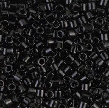 a pile of black plastic beads