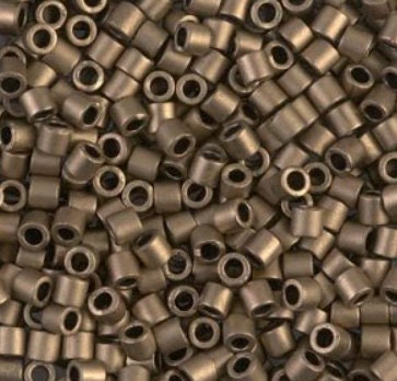 a close up of a pile of metal beads