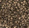 a close up of a pile of metal beads