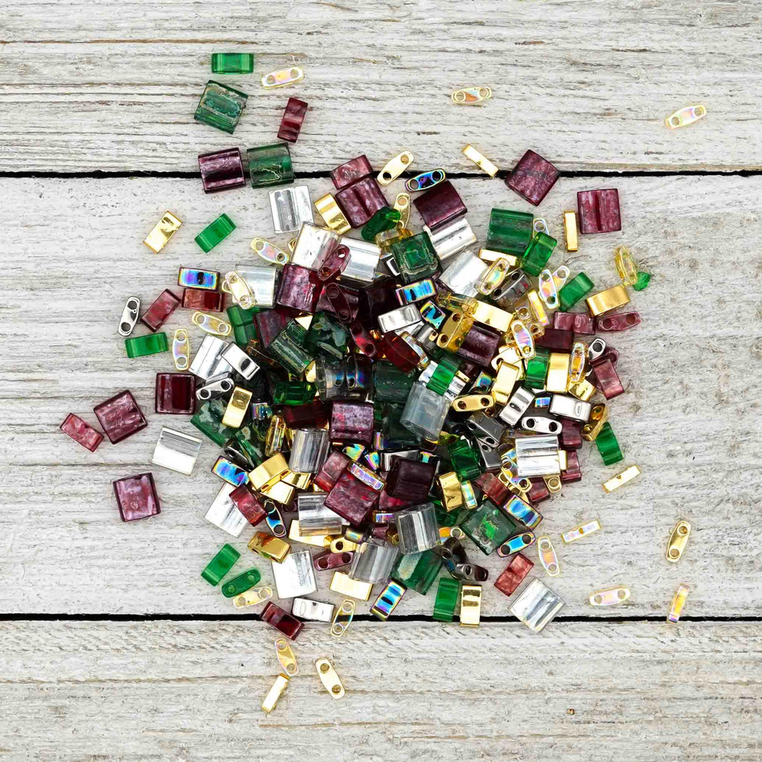 a pile of glass beads on a white surface