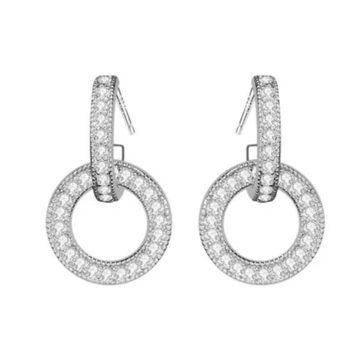 a pair of white gold and diamond earrings