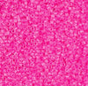 a pink background with lots of small beads
