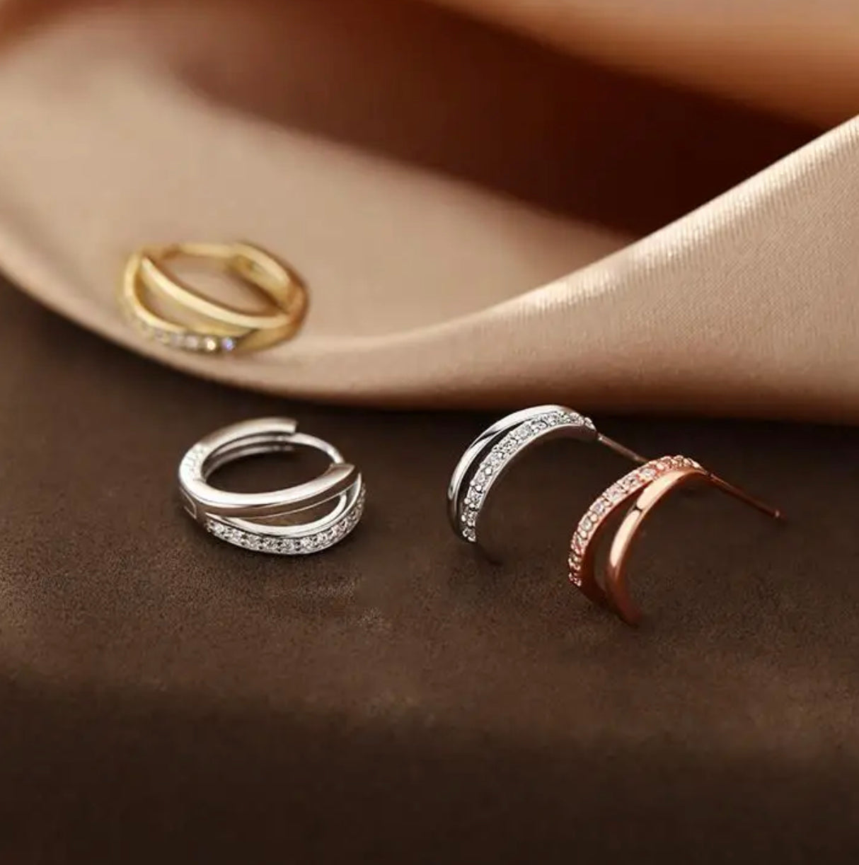 three different types of rings sitting on a table