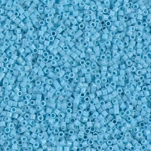 a close up of a bunch of blue beads