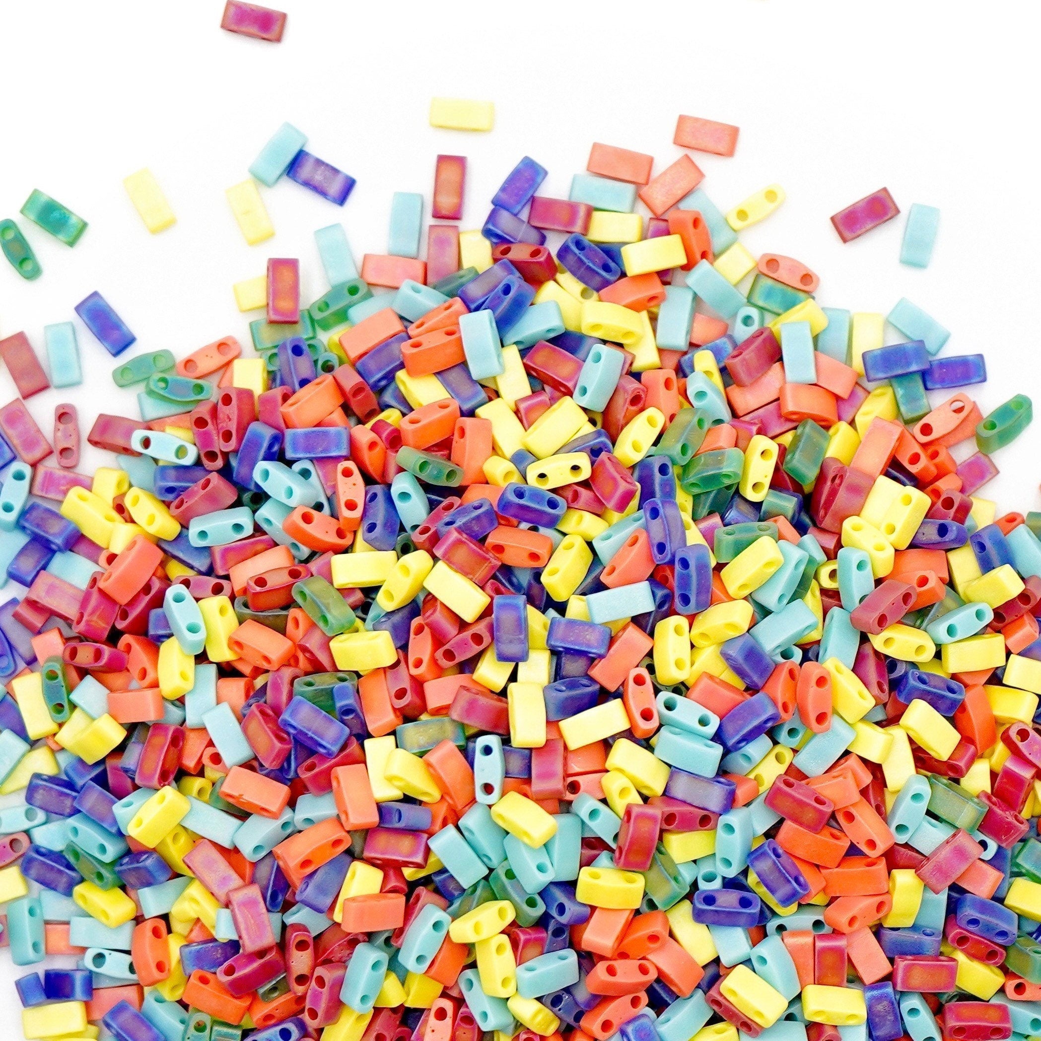 a pile of multicolored plastic letters and numbers