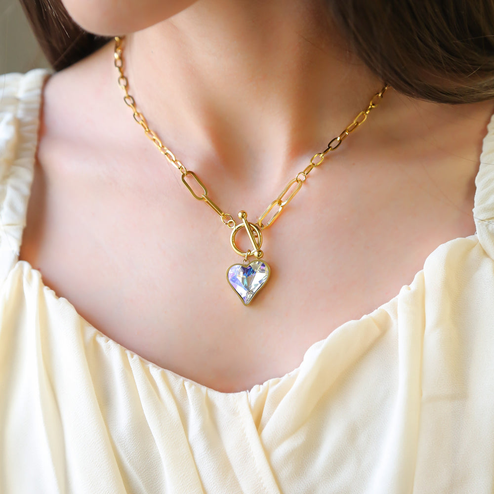 a close up of a woman wearing a necklace