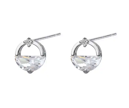 a pair of earrings with crystal stones