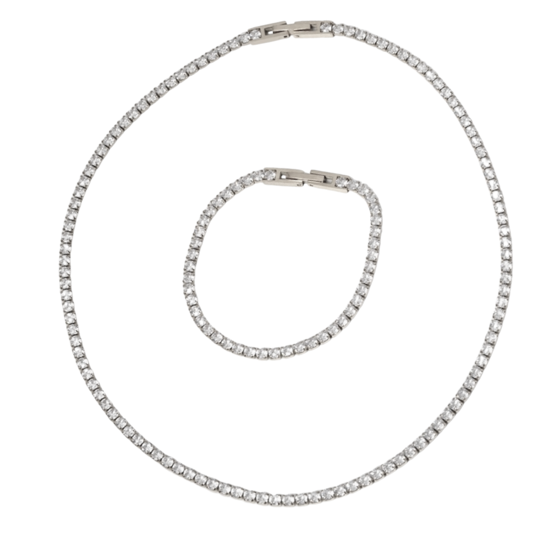 a white gold necklace with diamonds on a white background