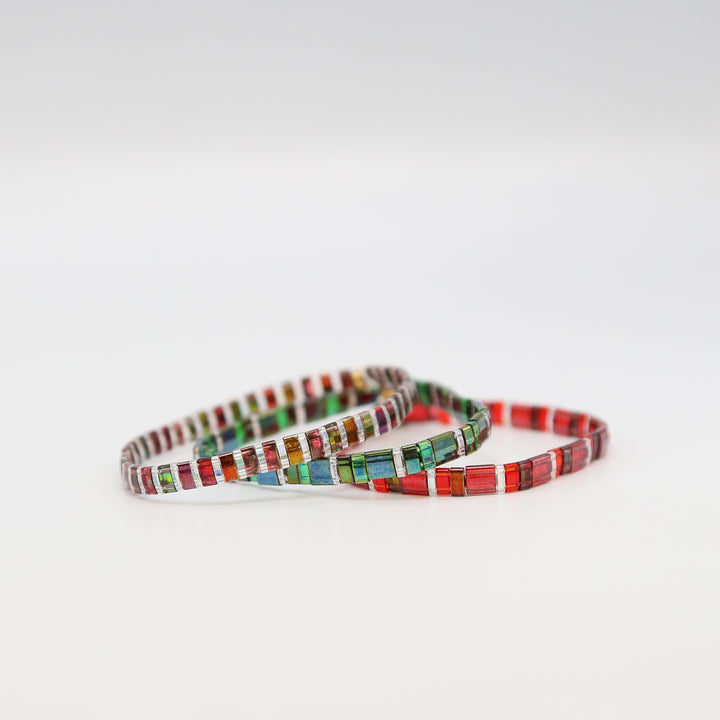 Colorful beaded bracelet on a white background